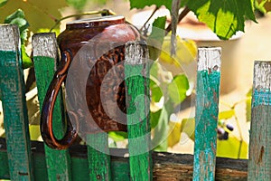 Pickets of old wooden fence. Abstract background with selective focus photo