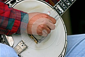 Picking the banjo