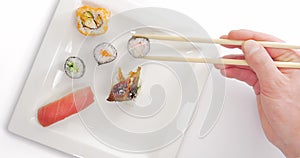 Picking and eating Japanese Sushi timelapse