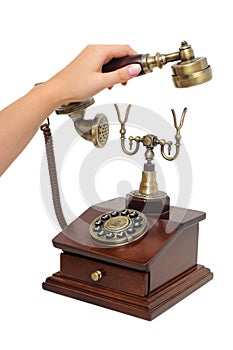 Picking up old-fashioned phone receiver