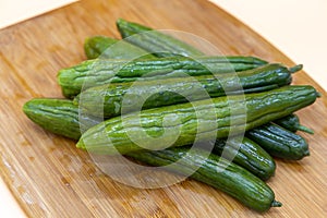 Pickle cucumbers on a cutting board