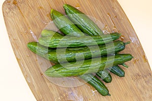 Pickle cucumbers on a cutting board
