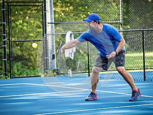 Pickleball Instructor demonstrates the backhand volley.tif photo