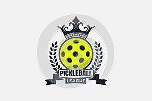 Pickleball league logo with a ball, crown, and ribbon