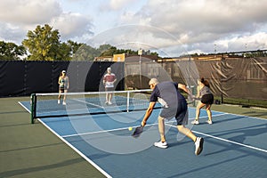 Pickleball Player Returns a Forehand Drive