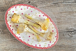 Pickled artichoke alla romana in the plate, traditional italian appetizer