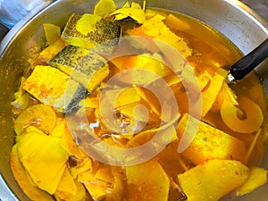 Pickled bamboo shoots with Barramundi fish in yellow sour and spicy soup