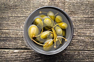 Pickled caper berries.