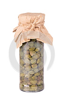 Pickled caper berries in jar isolated on white background. Capers isolated on white background. Pickled capers. Canned