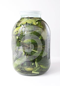 pickled cucumbers in a glass jar