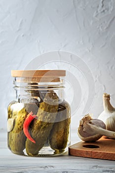 Pickled cucumbers in a jar