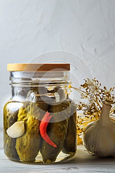 Pickled cucumbers in a jar