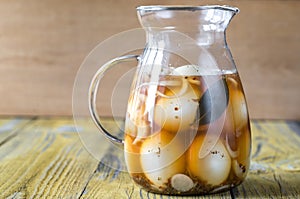 Pickled eggs in the glass jug