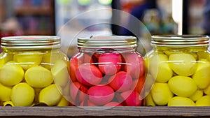 Pickled eggs at a product stand.