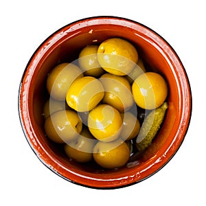 Pickled green olives with cucumber - typical Spanish tapas olivas verdes y pepinos