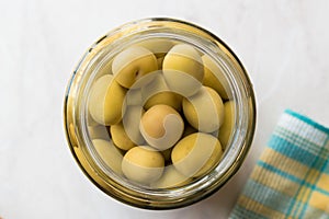 Pickled Green Olives in Glass Bottle Jar