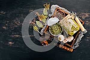 Pickled green peas in a jar. Stocks of food.