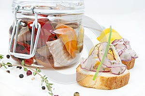 Pickled herring in a glass jar