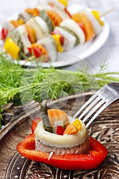 Pickled herring rolls with vegetables