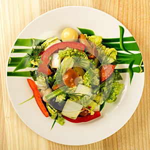 Pickled mushroom salad with raw fresh vegetables. Decorated with