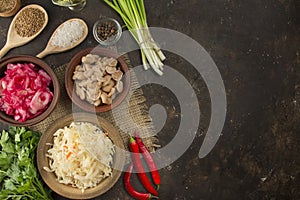 Pickled mushrooms, sauerkraut, coleslaw with beets on the table. Homemade food. Pickled vegetables. Vegetarian food. Top view,