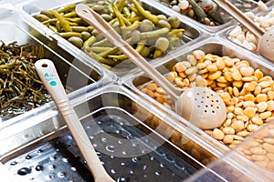 Pickled olives and lima beans for sale at Sineu market, Majorca