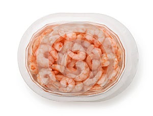 Pickled peeled shrimps in plastic container photo