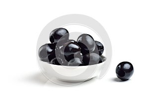 Pickled pitted black olives photo