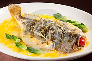 Pickled steamed yellow croaker