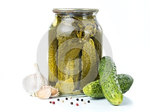 Pickles in glass jar isolated on white