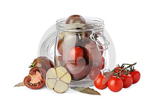 Pickling jar with fresh ripe cherry tomatoes and spices on background