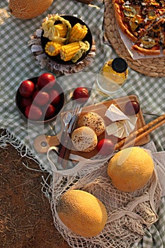 Picknick with food and fruits outdoors in nature