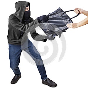 Pickpocket grabbing handbag from a woman
