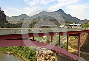 A Pickup Pulling a Travel Trailer Across the Salt River Canyon B