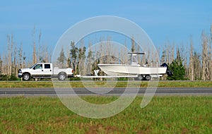 Pickup truck hauling boat