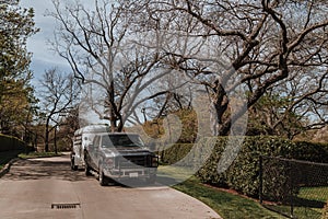 Pickup truck with horse carriage in the park