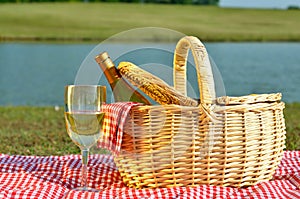 Picnic Basket and Glass of Wine