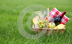 Picnic basket on grass