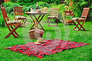 Picnic Blanket With Hat And Basket. Party Or Picnic Concept
