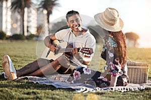 Picnic, date and man with guitar for romance, love and anniversary in Puerto Rico. Couple, happy and music in outing on