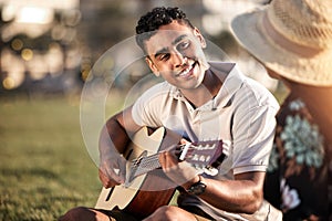 Picnic, date and man with instrument for romance, love and anniversary in Puerto Rico. Couple, happy and music in outing