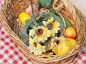 Picnic equipment, sun hats decorated with artificial flowers.