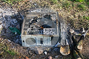 A picnic with a fire and a grill in the old computer case