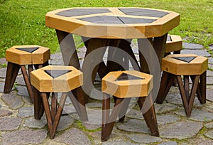 Picnic garden furniture: wooden table with chairs without people.summer outdoors