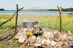 The picnic by the lake, smolder firewood