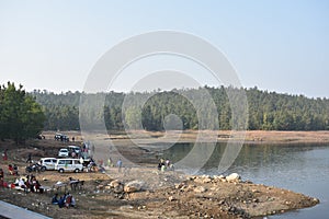 A picnic place near a lake just beside a island