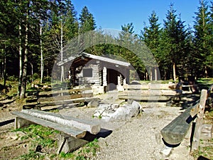 Picnic place with outings spot by the lake Forstseeli in the Alpstein mountain range and above the Rhine river valley Rheintal