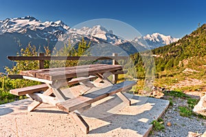 Picnic table and benches in mountains