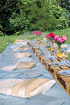 Picnic table in blue tones for many guests