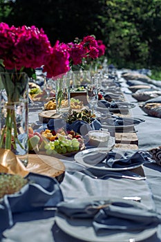 Picnic table in blue tones for many guests